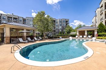 Resort style pool with sun shelf